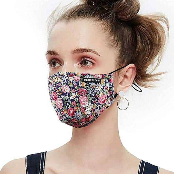 Woman wearing a print-on-demand face mask for protection.
